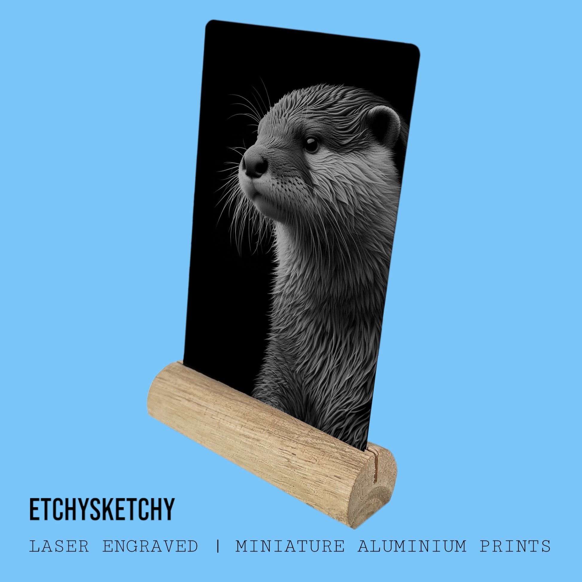 "Aluminium laser engraving of a playful otter swimming, capturing the fluid movement and natural charm of this aquatic mammal."