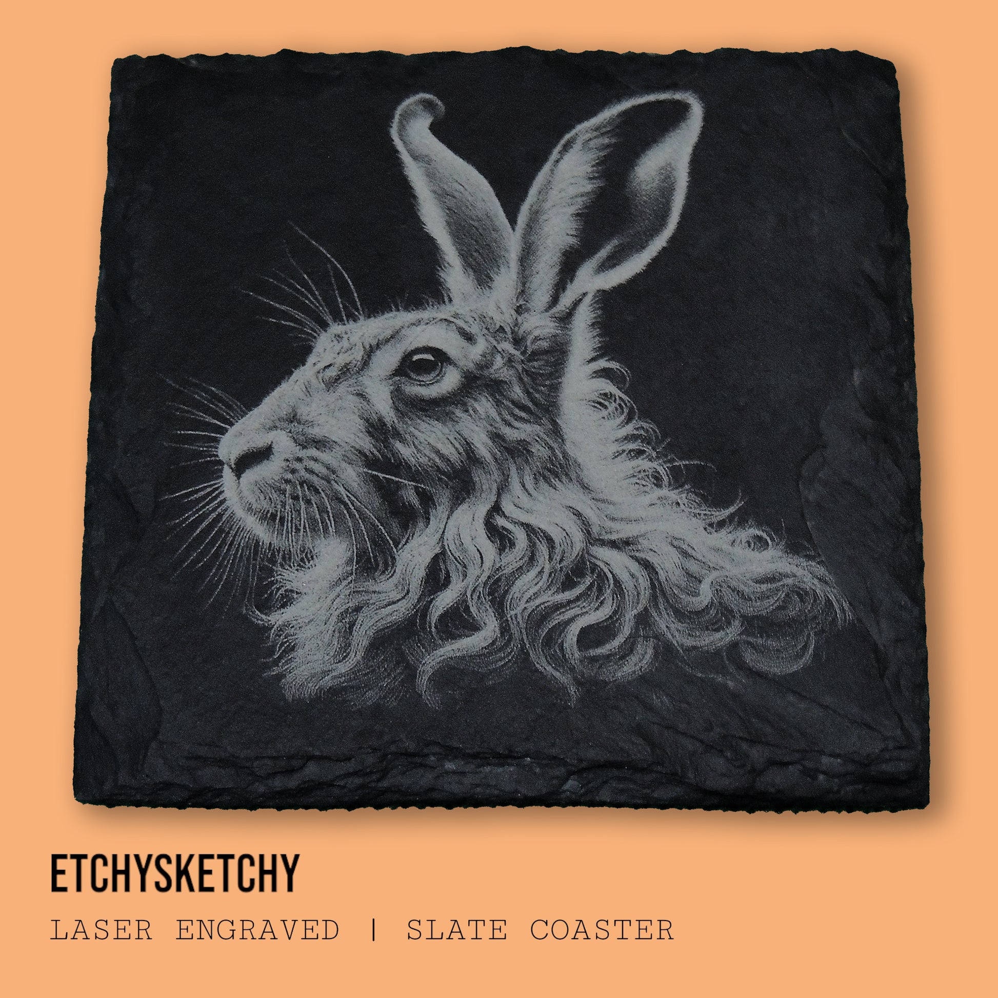 Elegant hare design laser-engraved, symbolizing agility and the quiet beauty of nature. "A 100mm x 100mm slate coaster featuring a laser-engraved hare face, with detailed fur and expressive features."