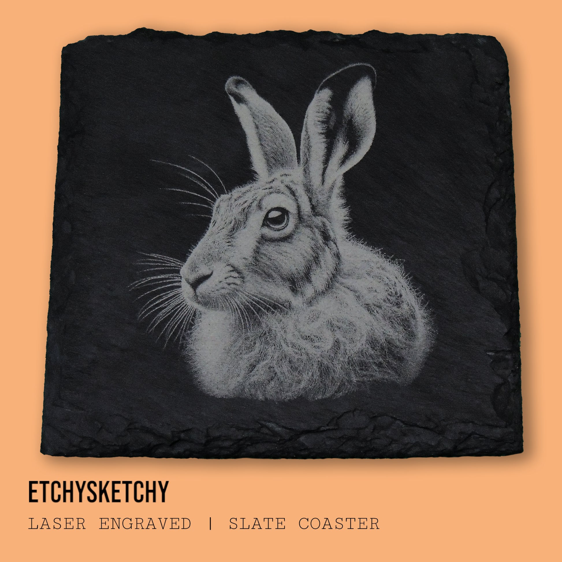 Elegant hare design laser-engraved, symbolizing agility and the quiet beauty of nature. "A 100mm x 100mm slate coaster featuring a laser-engraved hare face, with detailed fur and expressive features."