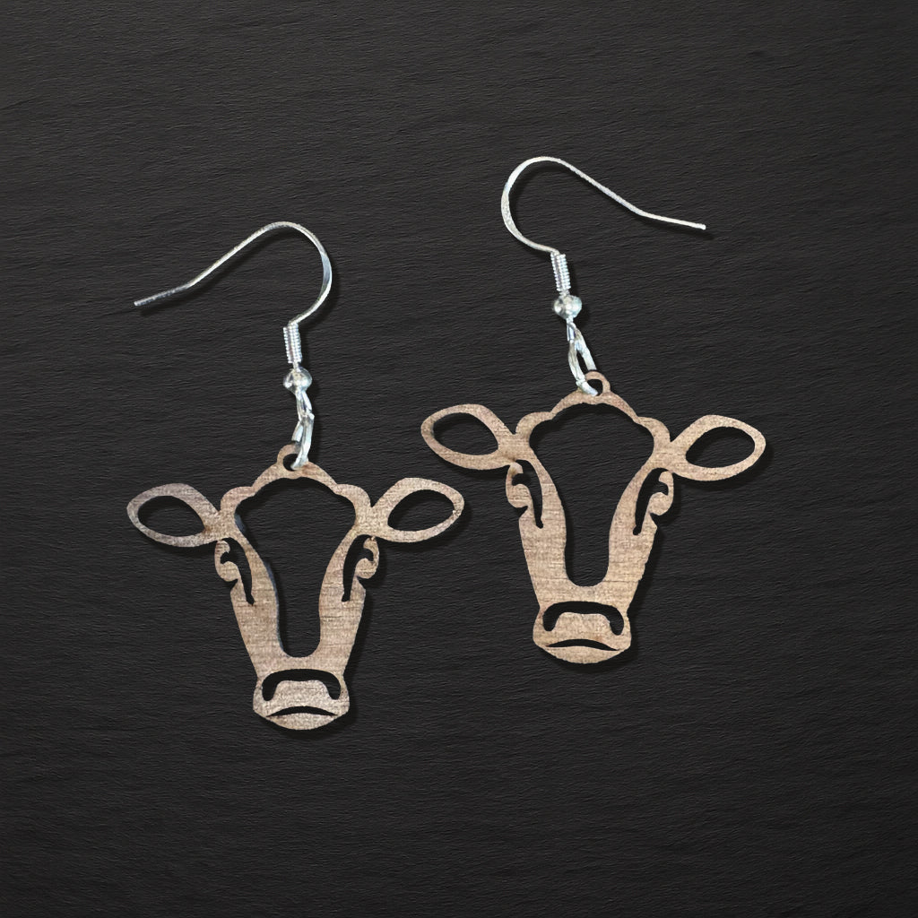 Walnut wood cow face earrings with laser-cut design and 925 sterling silver hooks, sustainable wildlife jewellery